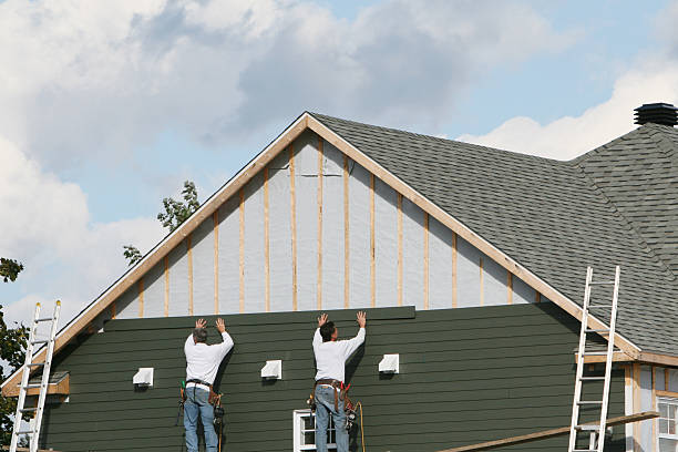 Professional Emergency Siding Repair technician working in East Northport, NY